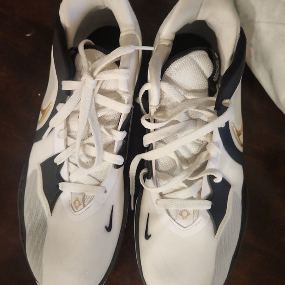 Nike White and Black Athletic Shoes with Modern Design